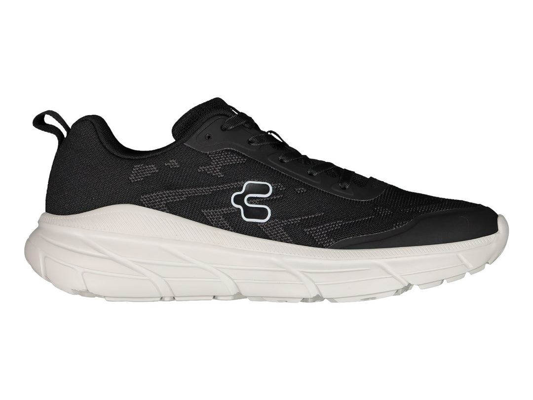 Tenis deportivos Charly color negro con suela blanca.
