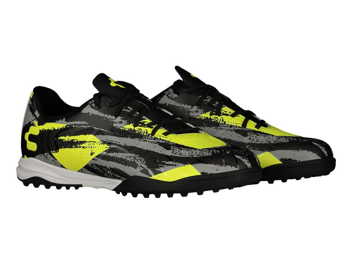 Zapato de fútbol Charly modelo 10 en colores negro, gris y lima con diseño gráfico abstracto y suela para pasto sintético.