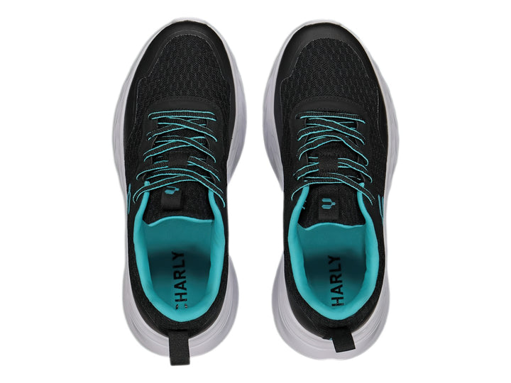 Tenis deportivos Charly color negro con suela blanca y detalles en turquesa.