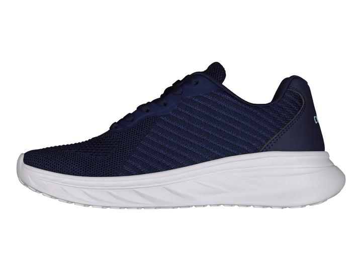 Tenis deportivos Charly en color azul marino con suela blanca y logotipo lateral en tono turquesa.
