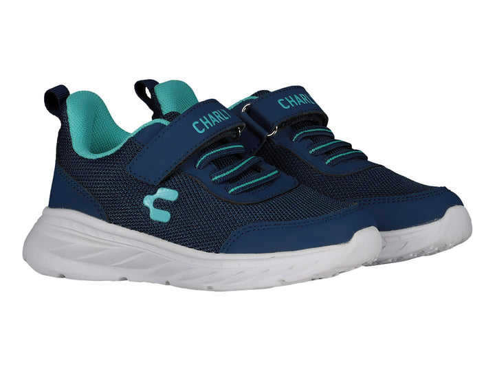 Tenis deportivos Charly color azul marino con suela blanca y detalles en turquesa.