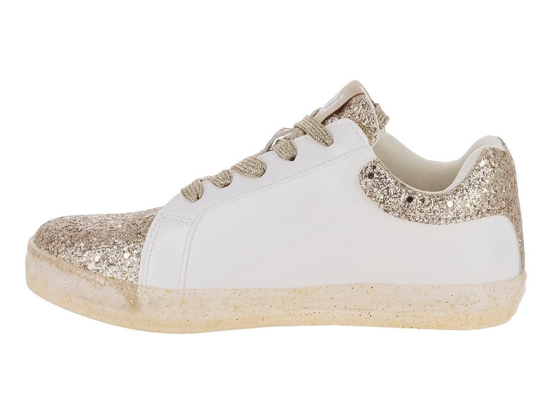 Tenis infantiles blancos con detalles brillantes en color oro, incluyendo una estrella lateral y punta brillante.