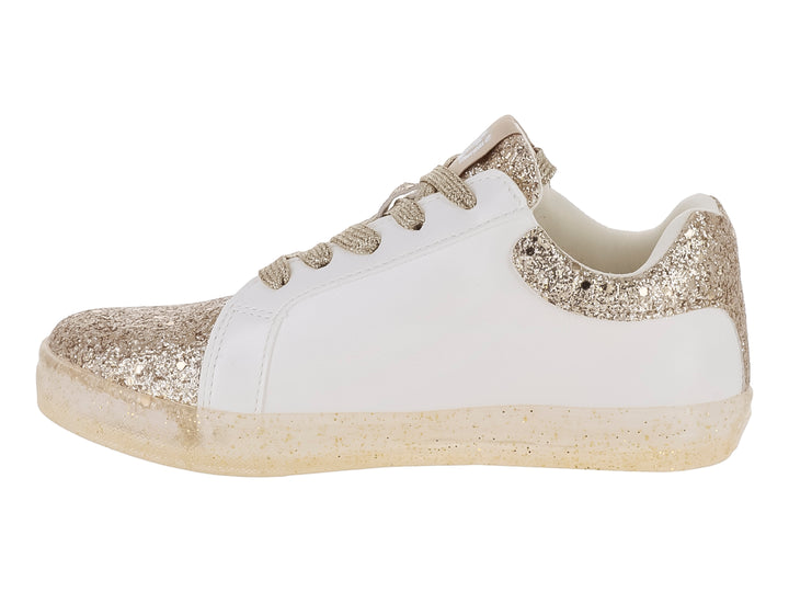Tenis infantiles blancos con detalles brillantes en color oro, incluyendo una estrella lateral y punta brillante.