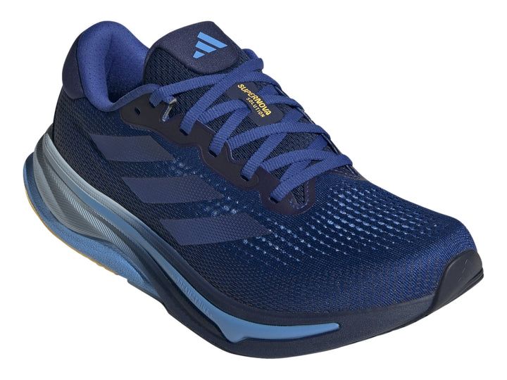 Tenis deportivos Adidas Supernova Solution en color azul con suela azul claro y detalles amarillos en la base.