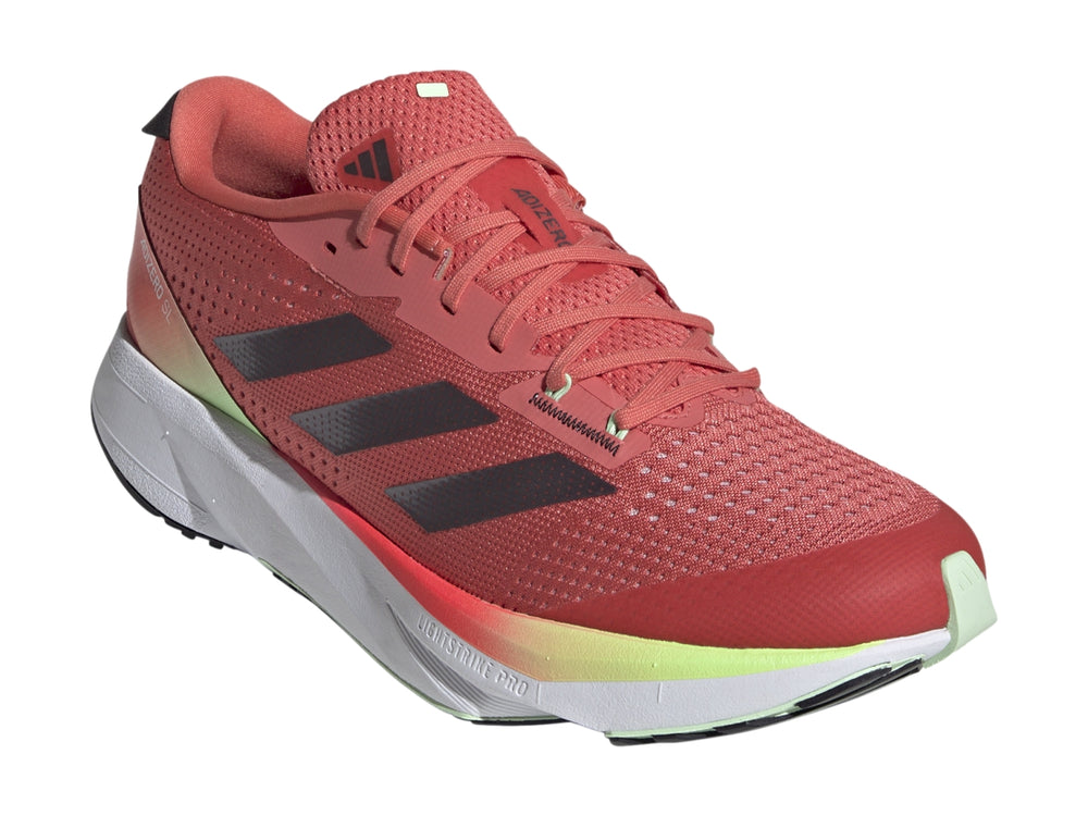 Tenis Adidas Adizero SL en color rojo con detalles en amarillo y suela blanca para correr.