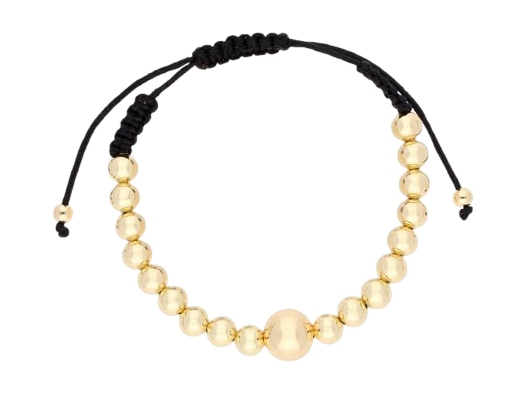 Pulsera de cuentas doradas brillantes con cordón ajustable de color negro.