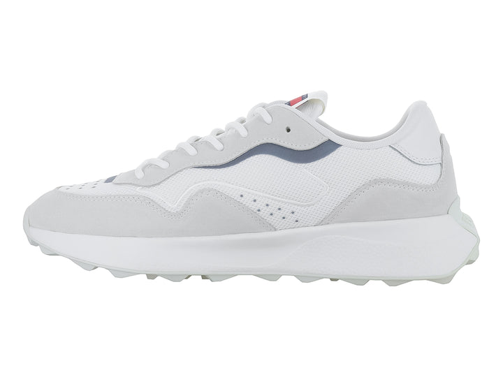 Tenis Tommy Hilfiger modelo Runner Mix Material en color ecru con suela blanca y diseño deportivo.