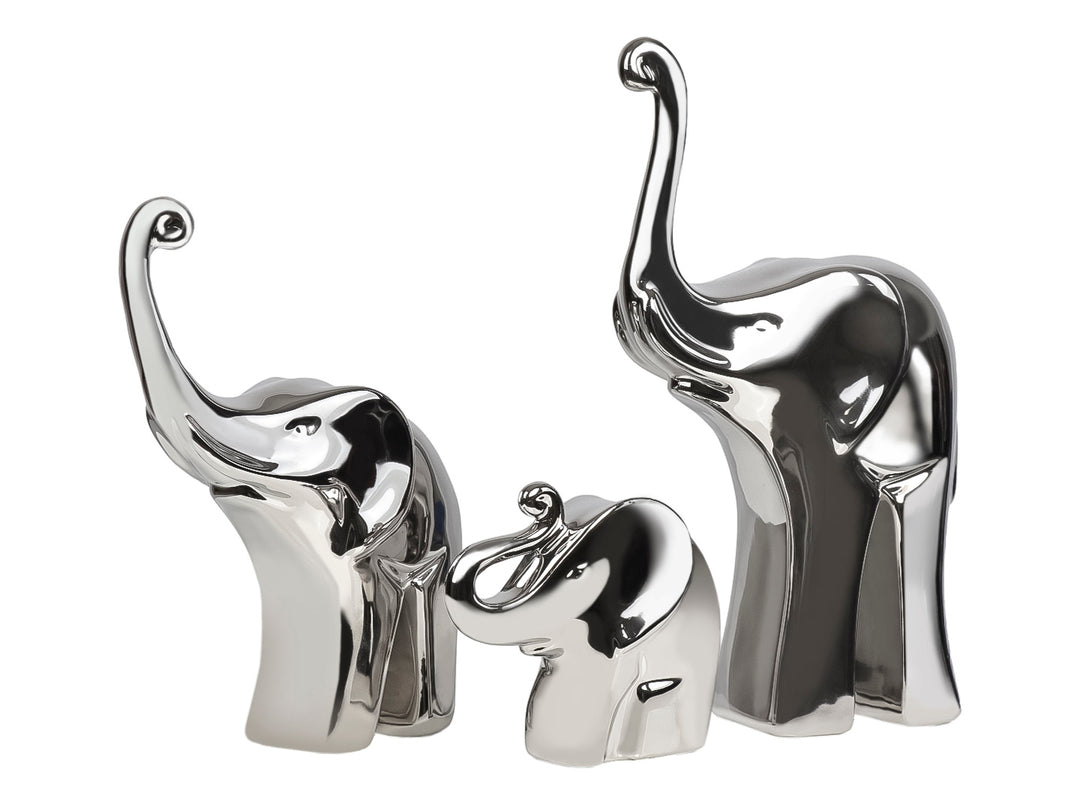 Set de tres figuras decorativas de elefantes en cerámica con acabado metálico color plata brillante.