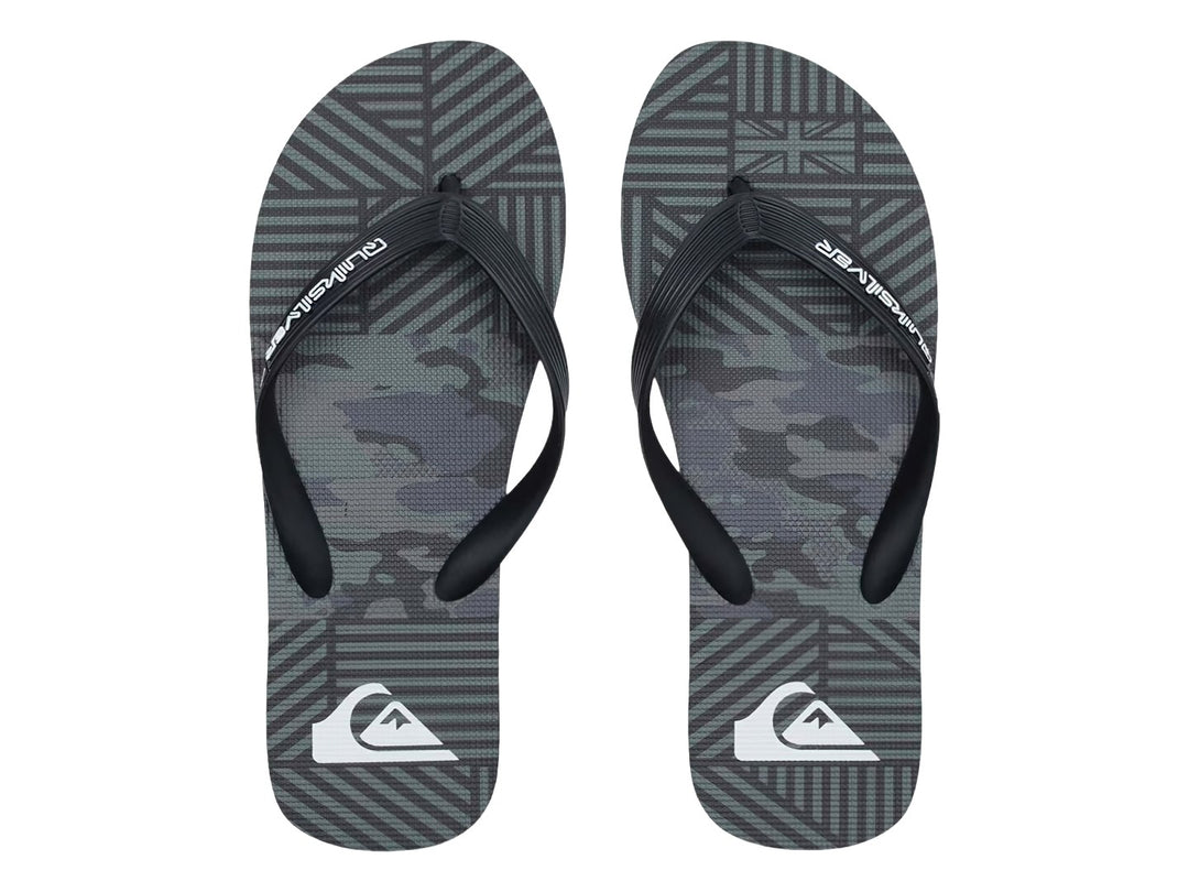 Sandalias Quiksilver color negro con detalles en gris, diseño plano y correa sencilla.