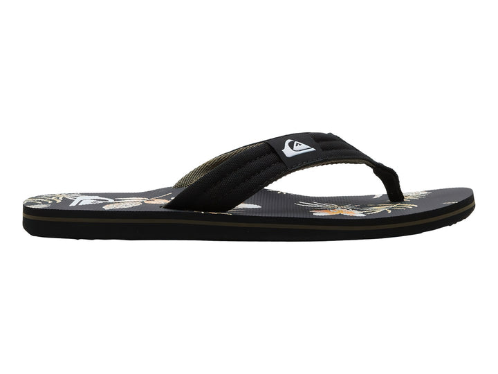 Sandalias Quiksilver negras con estampado tropical en la plantilla y correa negra.