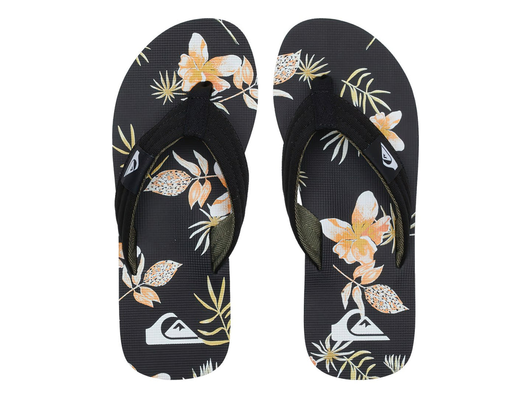 Sandalias Quiksilver negras con estampado tropical en la plantilla y correa negra.