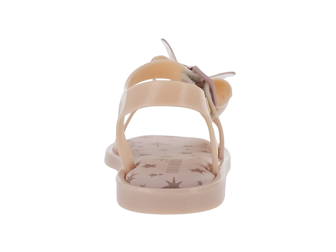 Sandalia rosa para bebé de Mini Melissa con moño decorativo y detalles de estrellas en la plantilla.
