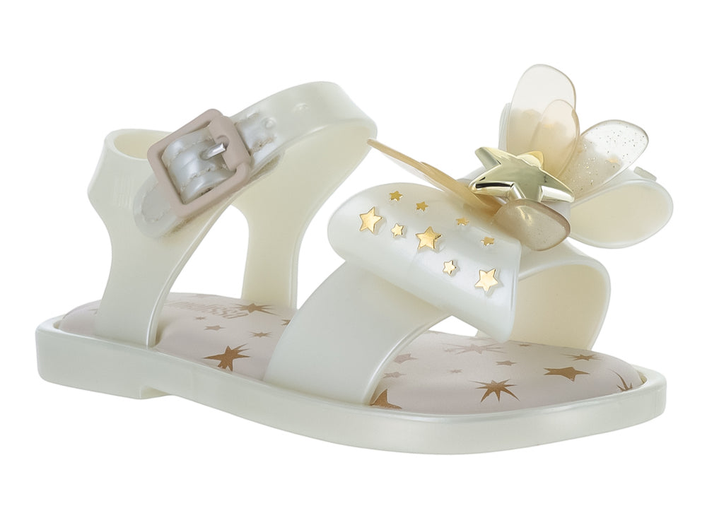 Sandalia blanca para bebé de Mini Melissa con adorno de mariposa y estrellas doradas.