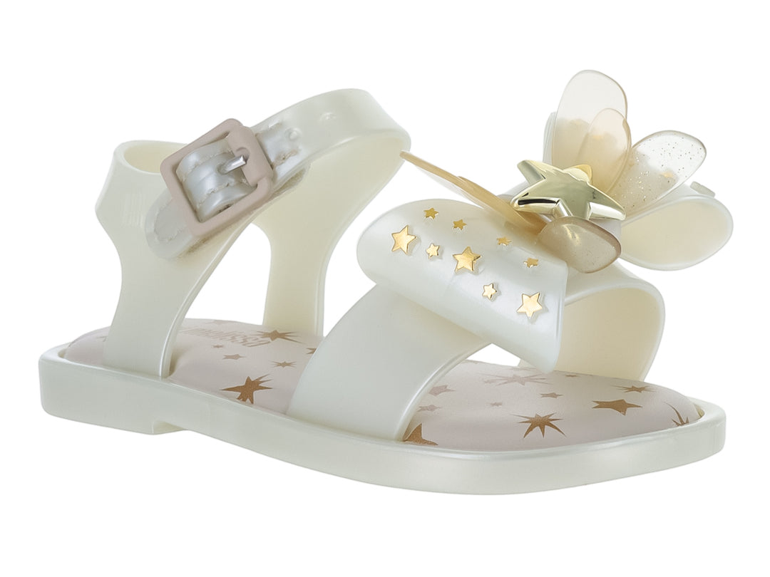 Sandalia blanca para bebé de Mini Melissa con adorno de mariposa y estrellas doradas.