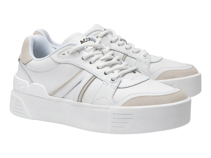 Tenis Lacoste en color blanco y blanco roto con suela de plataforma gruesa.
