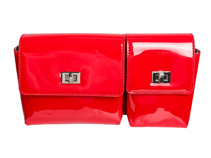 Bolso ROZE de color rojo brillante con acabado tipo charol y cierres metálicos plateados.