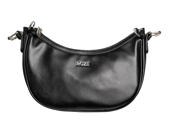 Bolso de hombro color negro marca ROZE con forma de media luna y detalles metálicos plateados.