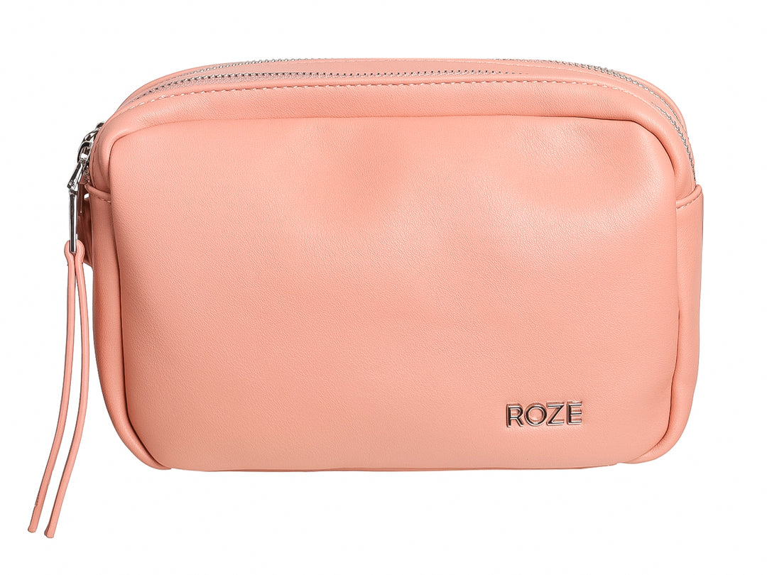 Bolso pequeño de color rosa con cierre de cremallera y logotipo ROZE en relieve.