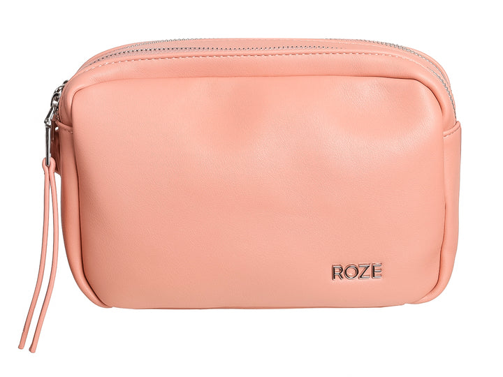 Bolso pequeño de color rosa con cierre de cremallera y logotipo ROZE en relieve.