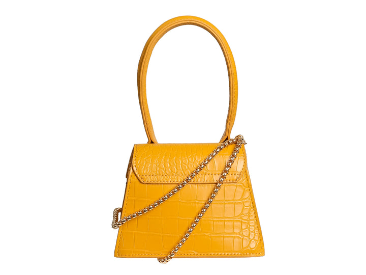Bolso amarillo ROZE con textura de piel de cocodrilo y asa circular.