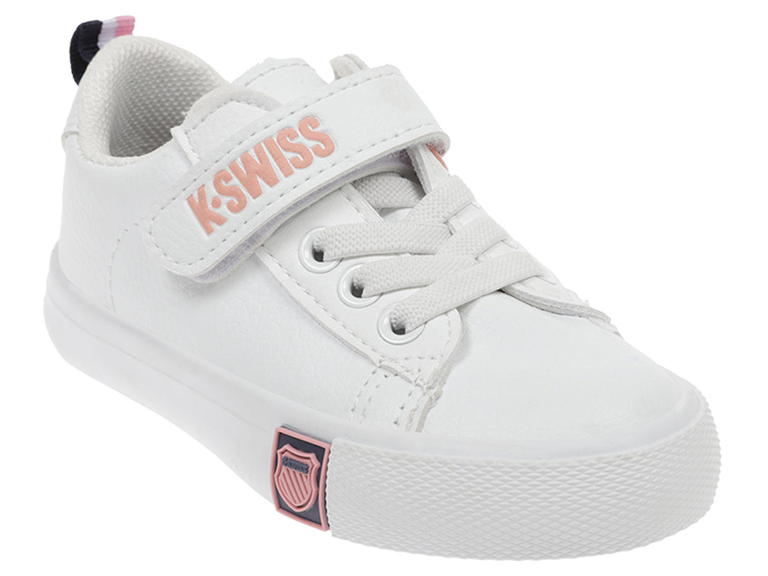 Tenis blancos K-SWISS para bebé con correa de velcro y detalles en rosa.