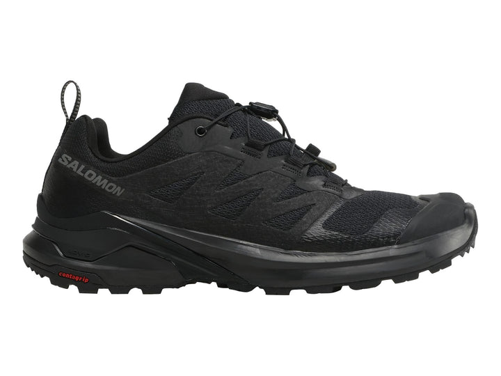 Zapato deportivo Salomon X-Adventure color negro con suela de agarre y tejido transpirable.