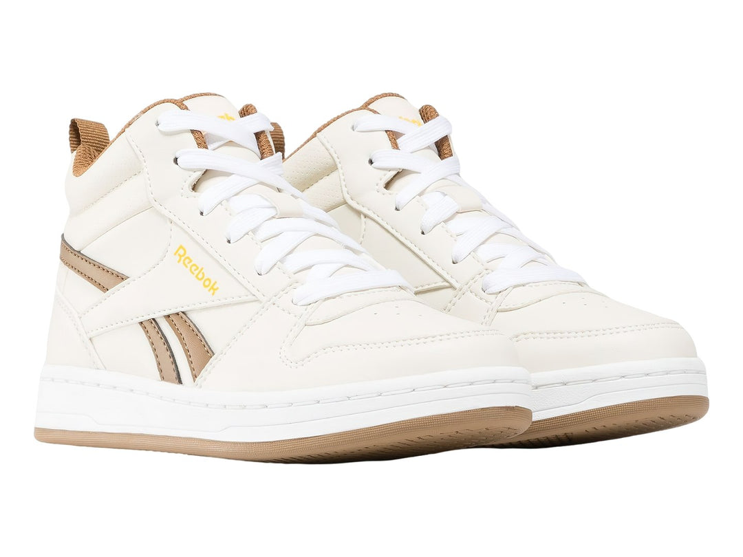 Tenis Reebok Royal Prime Mid 2.0 color blanco hueso con detalles y suela en tono beige.
