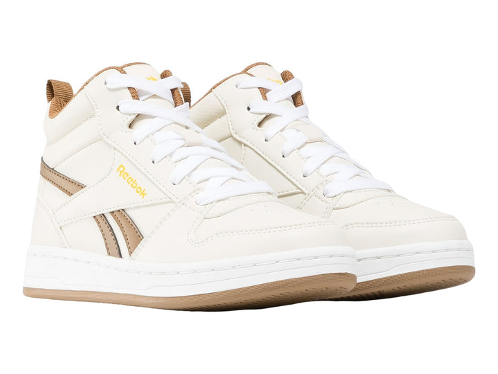 Tenis Reebok Royal Prime Mid 2.0 color blanco hueso con detalles y suela en tono beige.