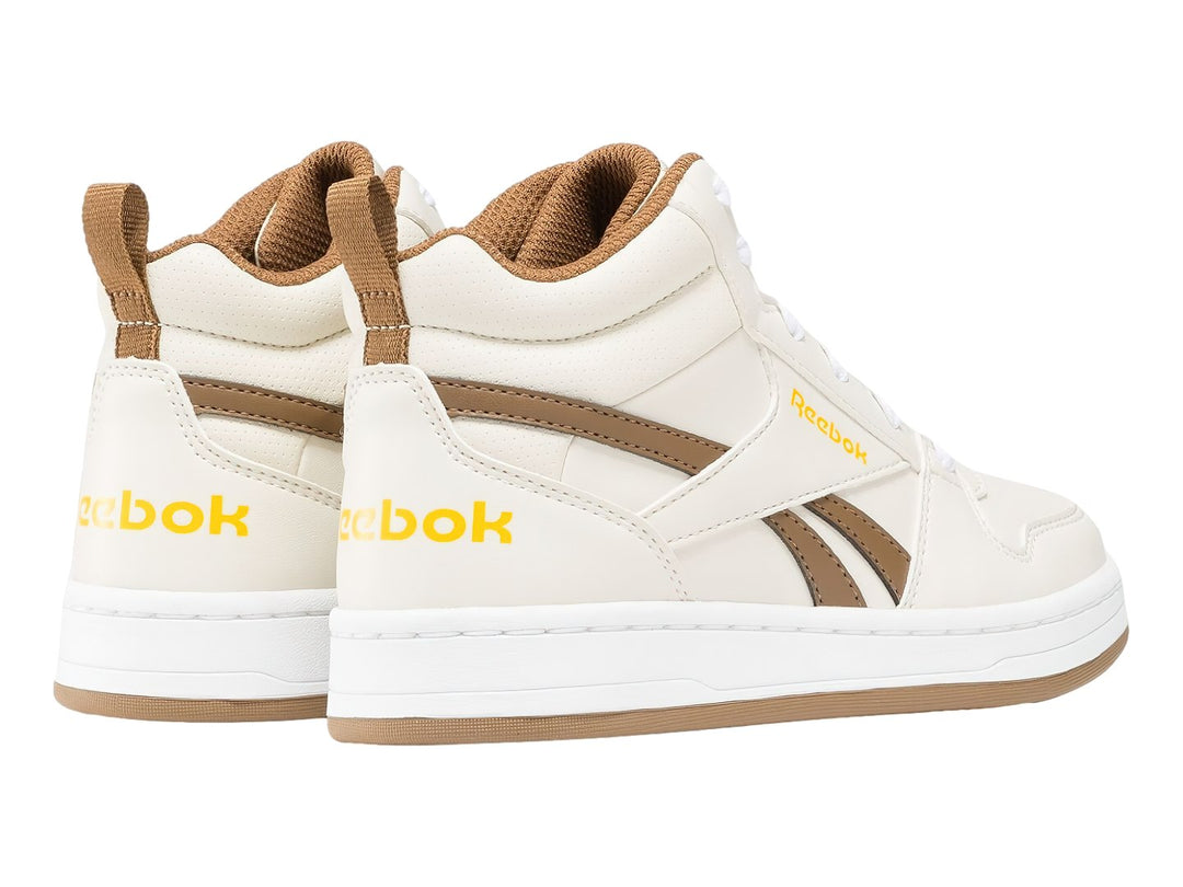 Tenis Reebok Royal Prime Mid 2.0 color blanco hueso con detalles y suela en tono beige.