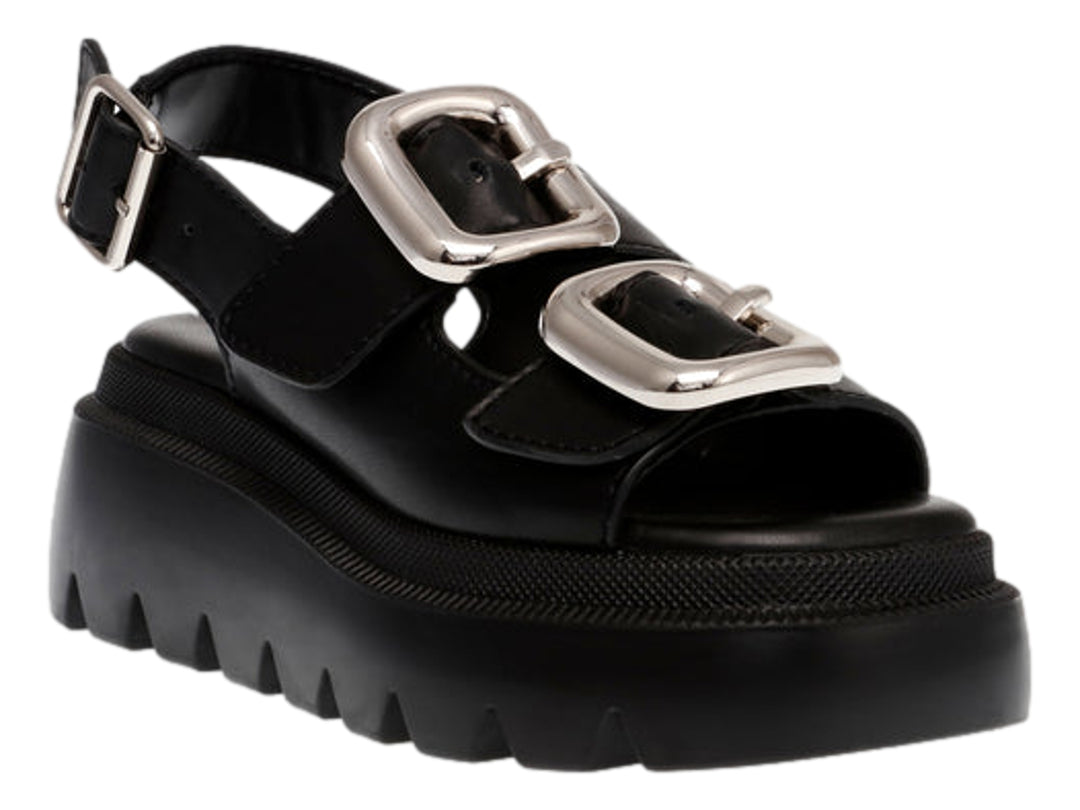 Sandalias negras de plataforma Steve Madden con suela dentada y hebillas plateadas.