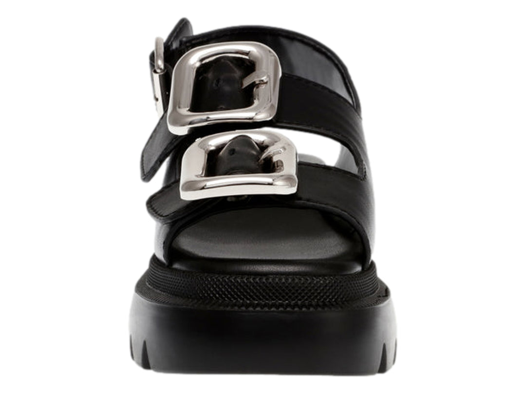 Sandalias negras de plataforma Steve Madden con suela dentada y hebillas plateadas.