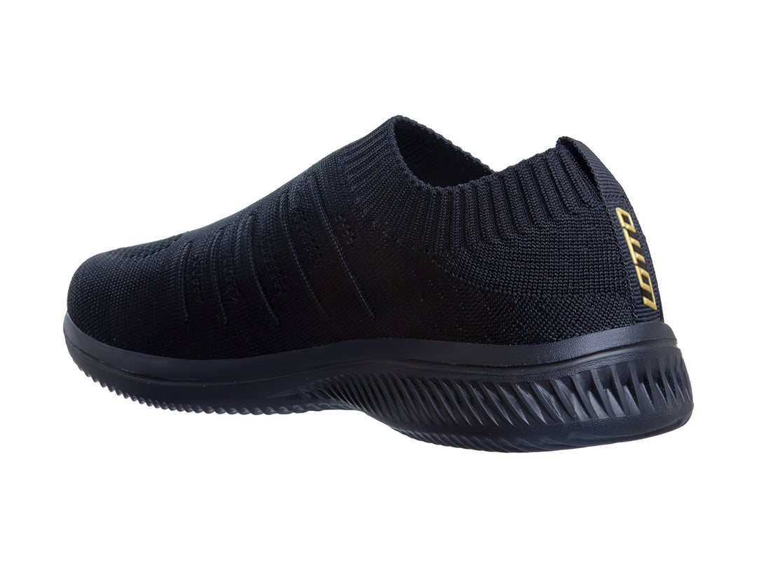 Tenis deportivos Lotto color negro, estilo slip-on sin cordones con suela texturizada.
