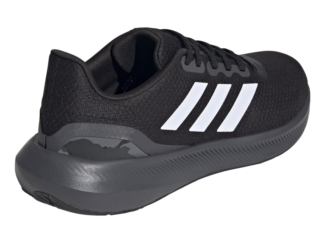Tenis deportivos Adidas Runfalcon 3.0 color negro con tres franjas blancas laterales y suela gris oscuro.