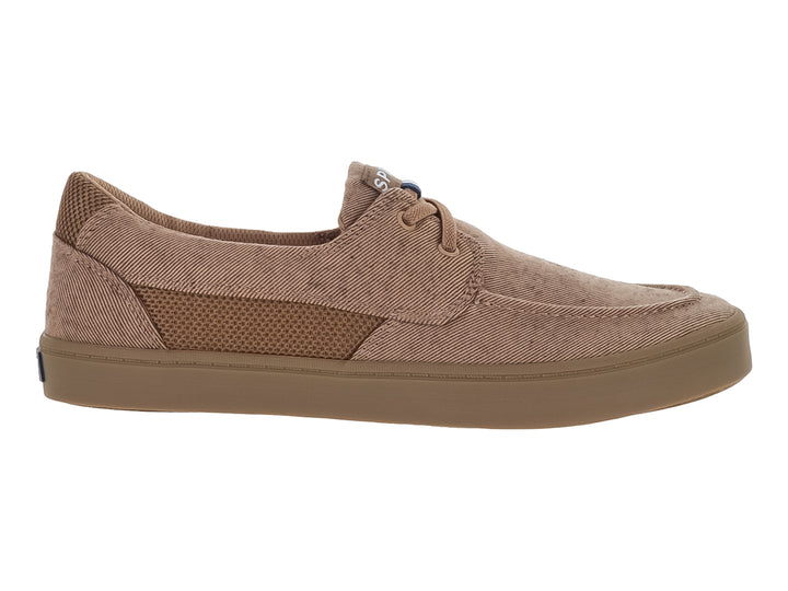 Zapato casual de tela color arena con suela plana y cordones.