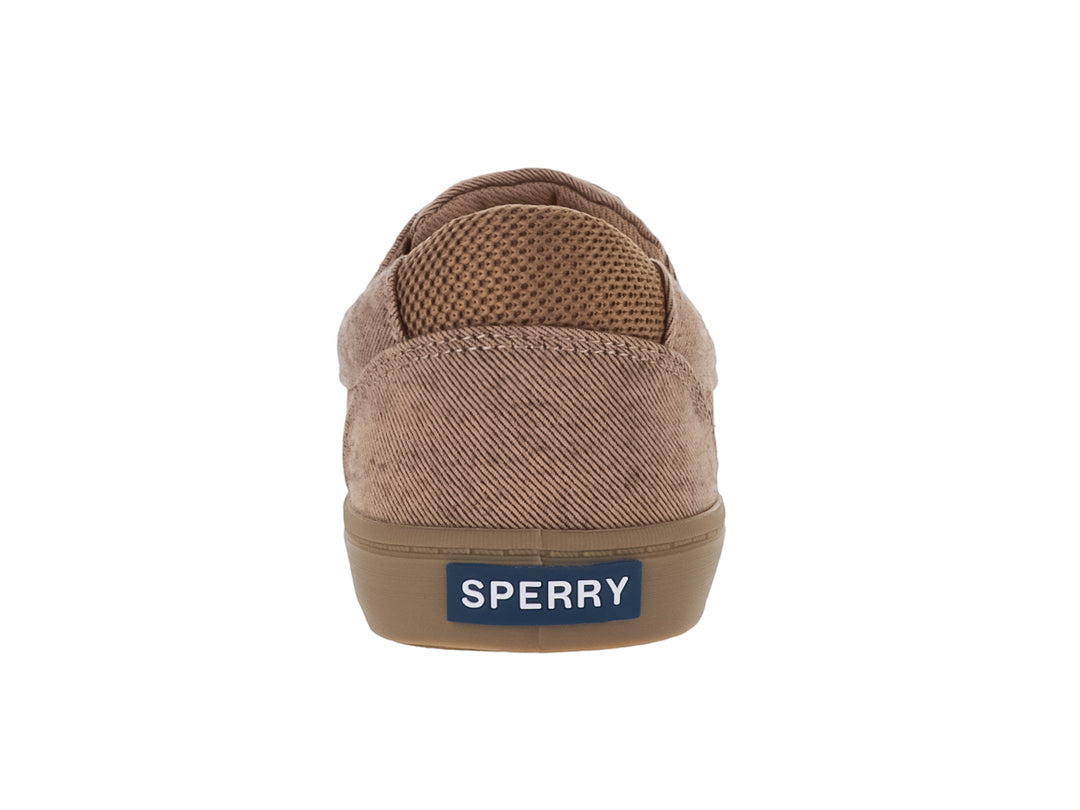 Zapato casual de tela color arena con suela plana y cordones.