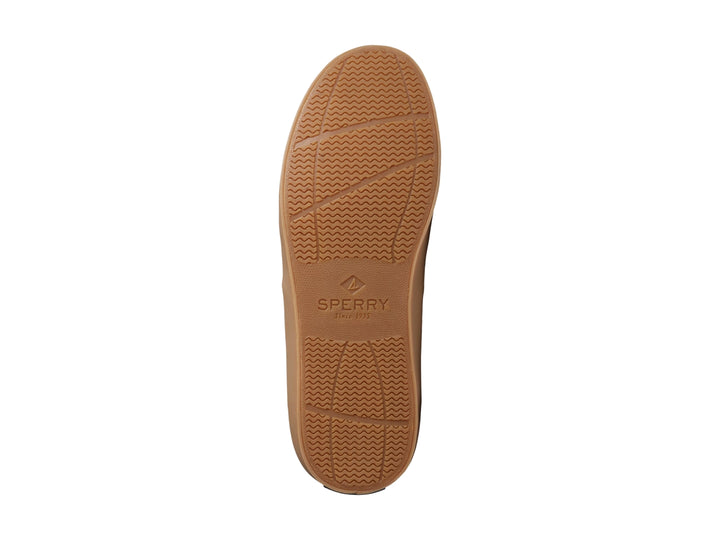 Zapato casual de tela color arena con suela plana y cordones.