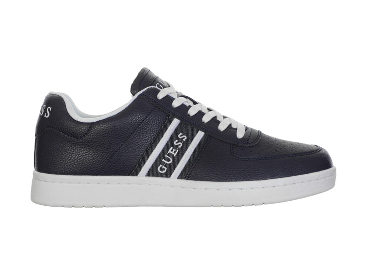Tenis deportivos Guess en color azul con suela y detalles laterales en blanco.