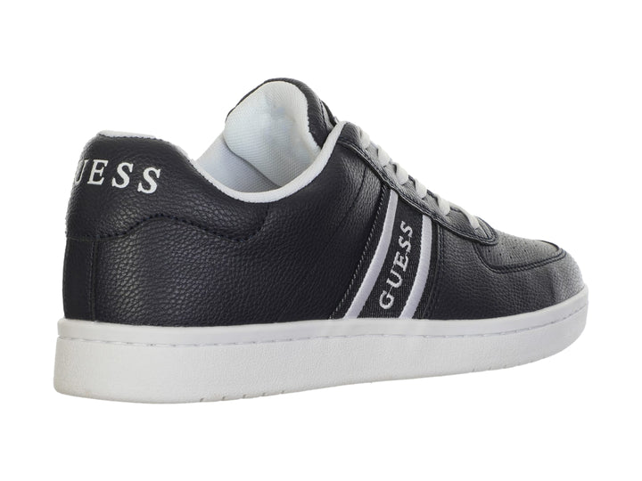 Tenis deportivos Guess en color azul con suela y detalles laterales en blanco.