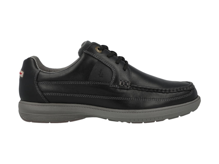 Zapato casual de cuero negro con suela gris y cordones.