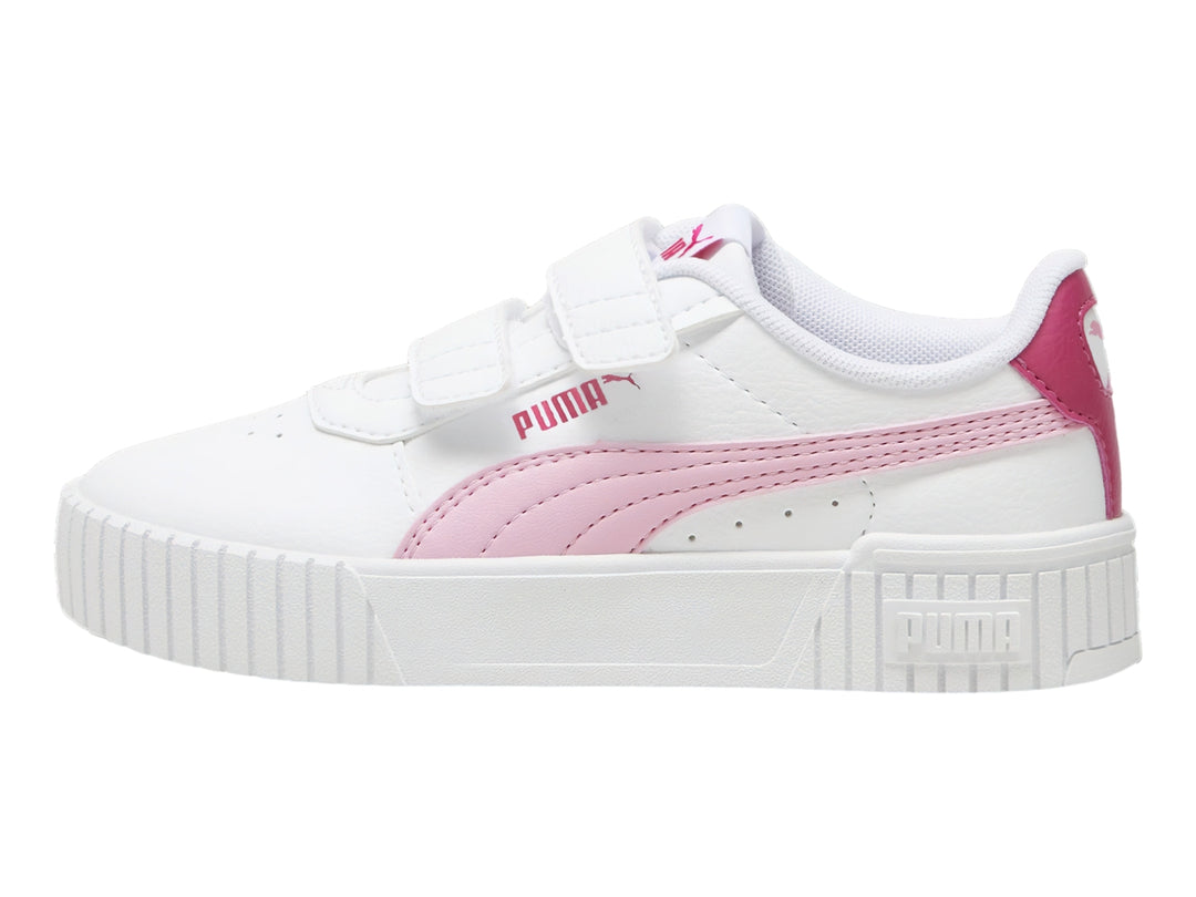 Tenis PUMA Carina 2.0 color blanco con detalles en rosa y cierre de velcro para niña.