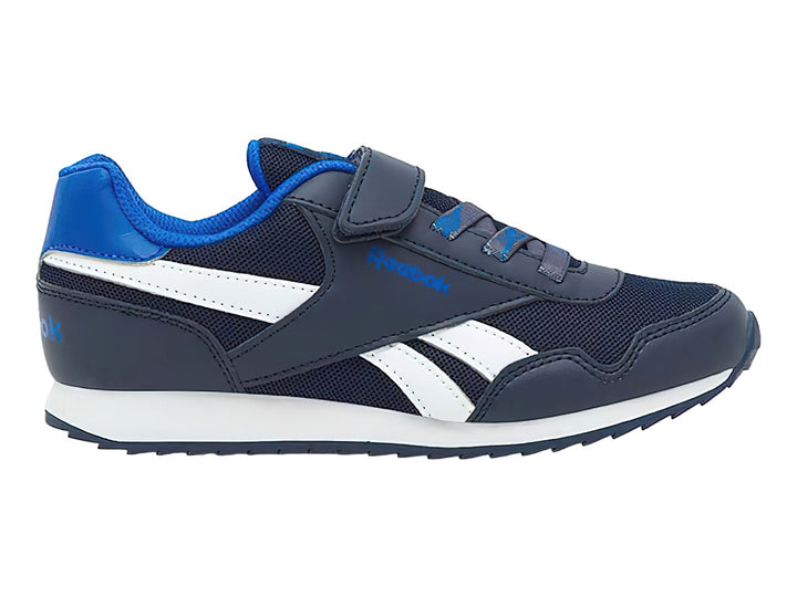Tenis deportivos Reebok azul marino y blanco con correa de velcro para niño.