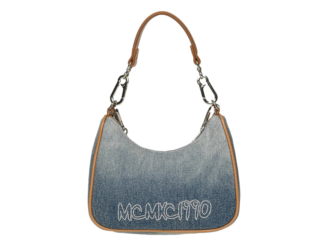 Bolso de hombro azul denim con cadena plateada y bordes cafés de Steve Madden.