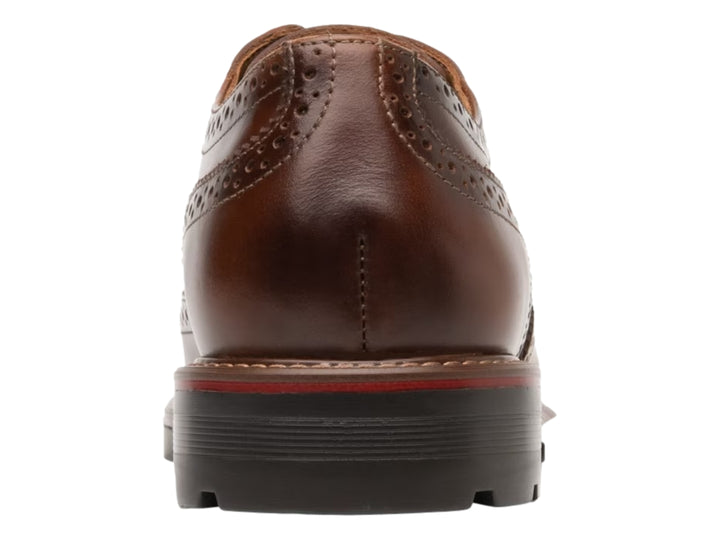 Zapato de cuero color cognac para hombre con perforaciones decorativas y suela gruesa