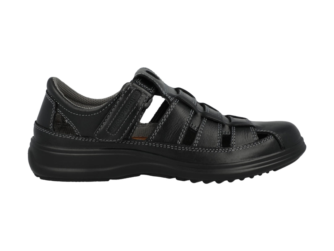 Sandalia cerrada color negro para niño o niña de la marca Hush Puppies.