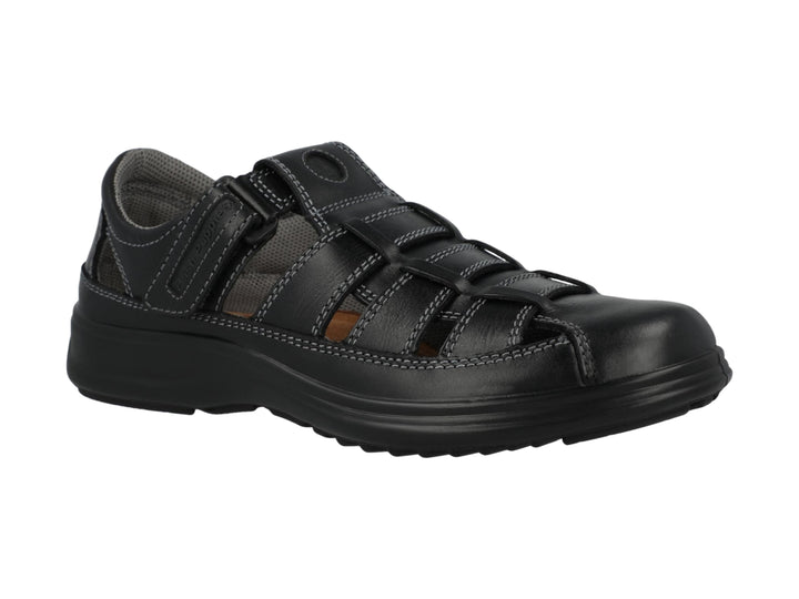 Sandalia cerrada color negro para niño o niña de la marca Hush Puppies.