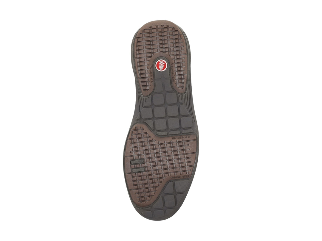 Zapato casual negro de la marca Hush Puppies con suela gris y cierre de agujetas.