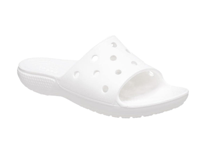 Par de sandalias Crocs Classic Slide V2 en color blanco con perforaciones circulares en la banda superior.