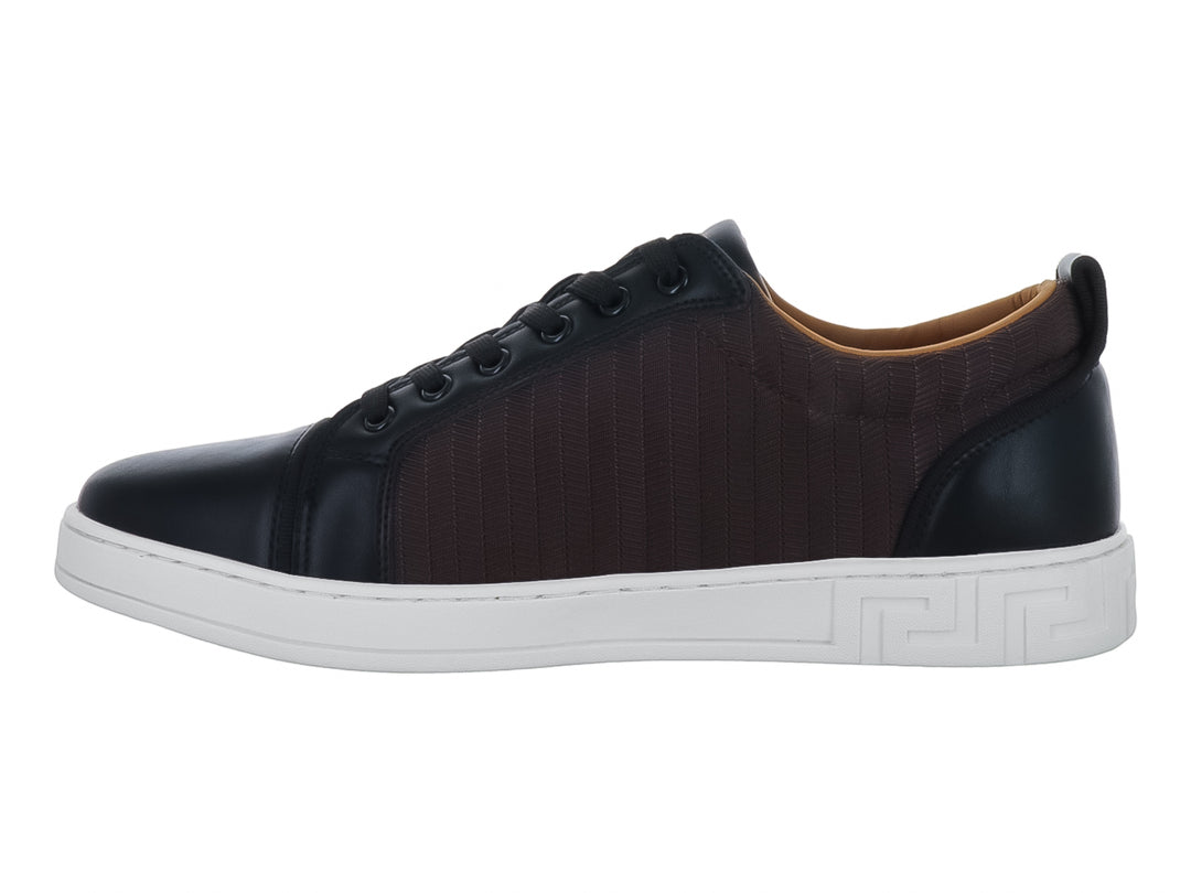 Tenis casual Platini en colores café y negro con suela blanca y detalles decorativos laterales.