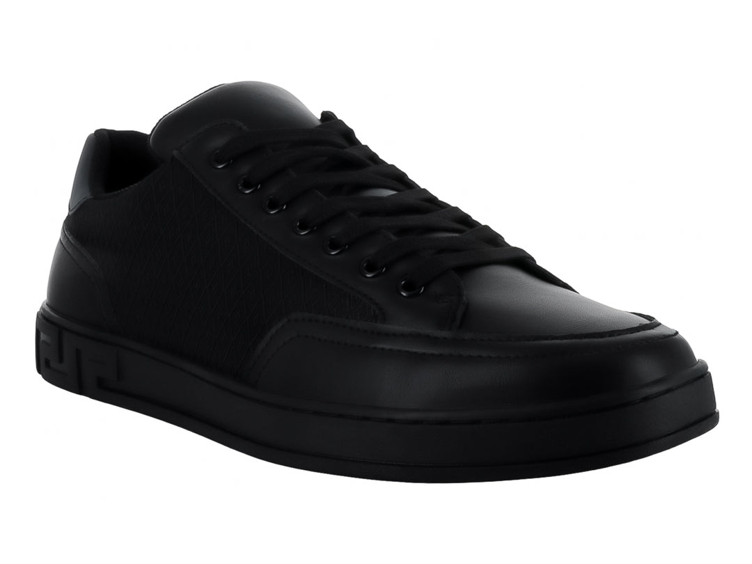 Tenis casuales color negro con detalles de malla y suela plana.