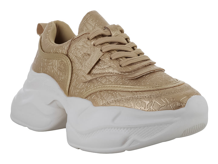 Tenis PLATINI color dorado con suela blanca ancha y plataforma